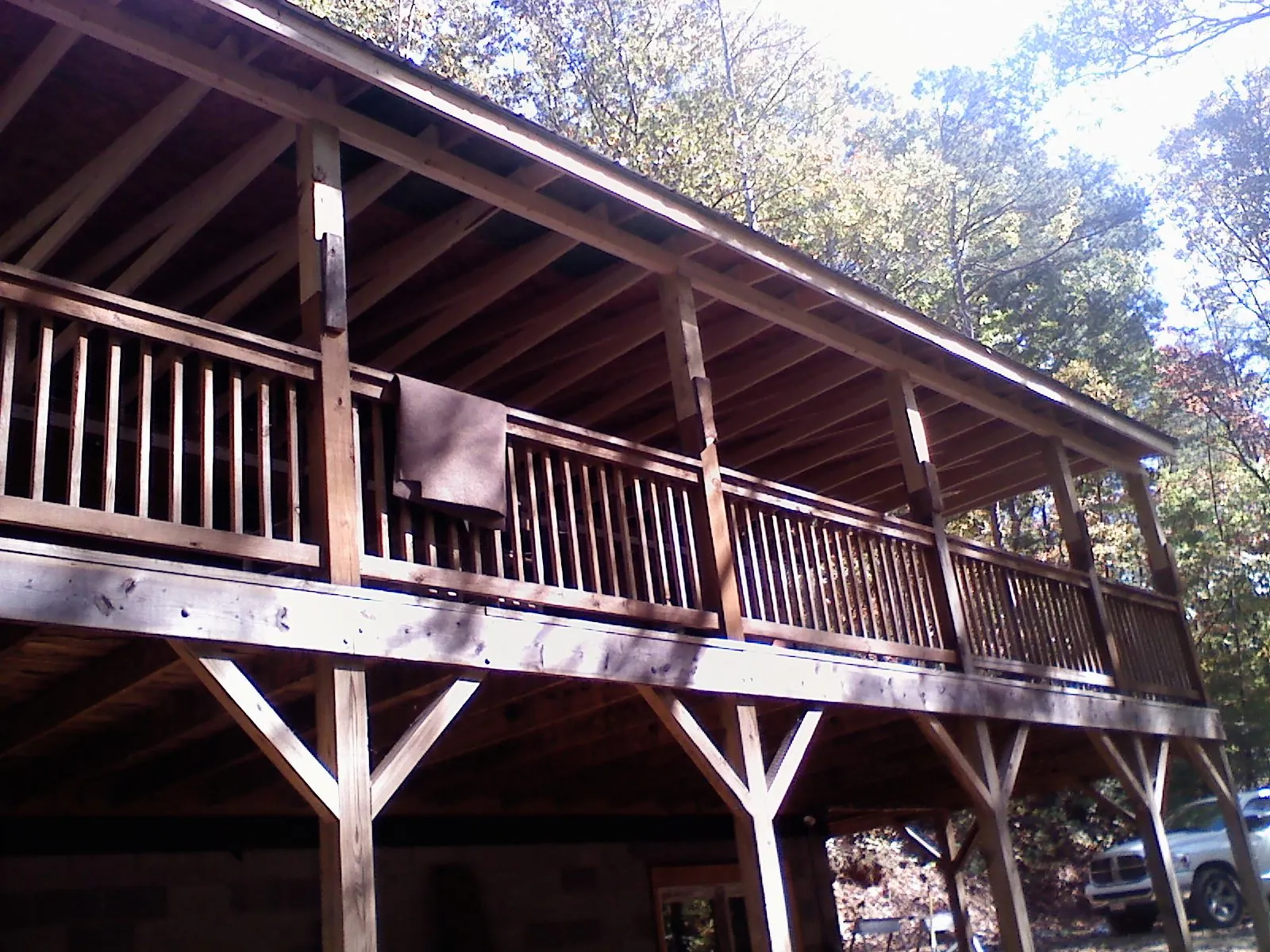 Timber framing under a new elevated porch and deck — Roof Leak Repair in Villanova by Roofing Brothers